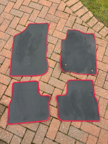 Four car mats set front - four,